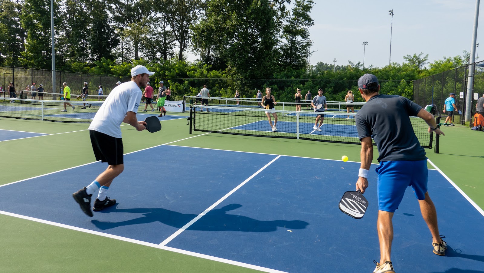 A pickleball doubles match