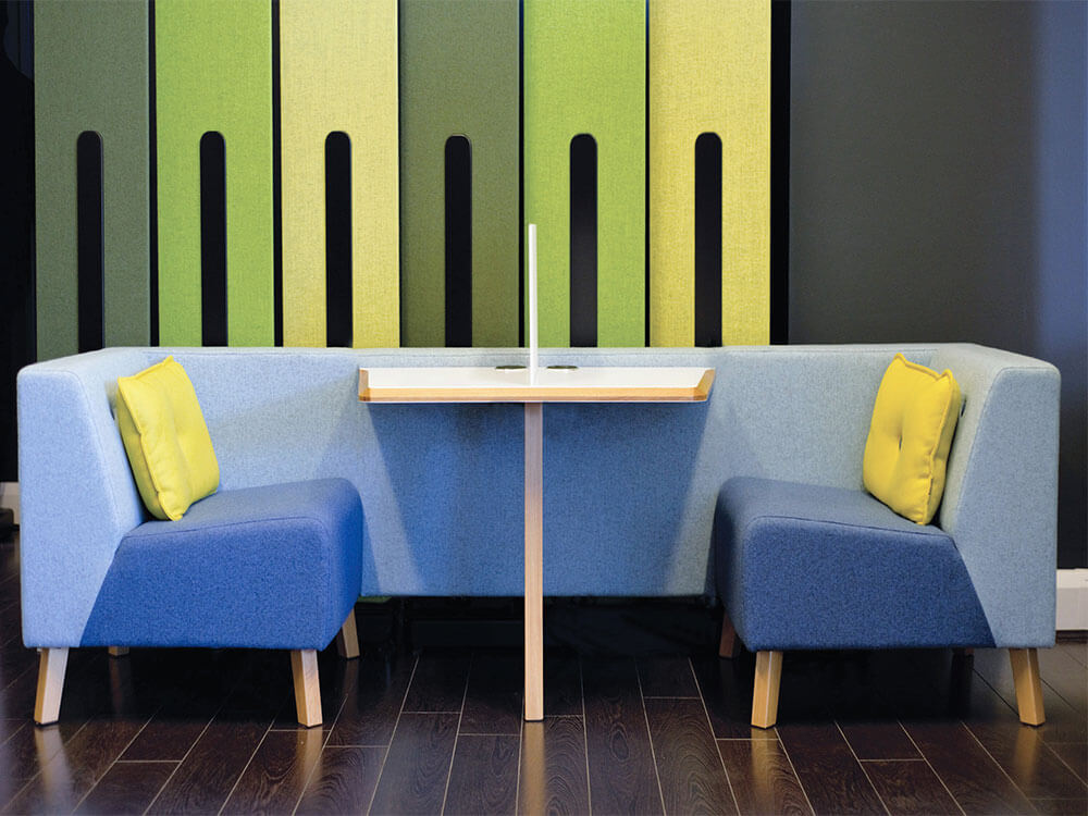 Blue and yellow two-person low office pod