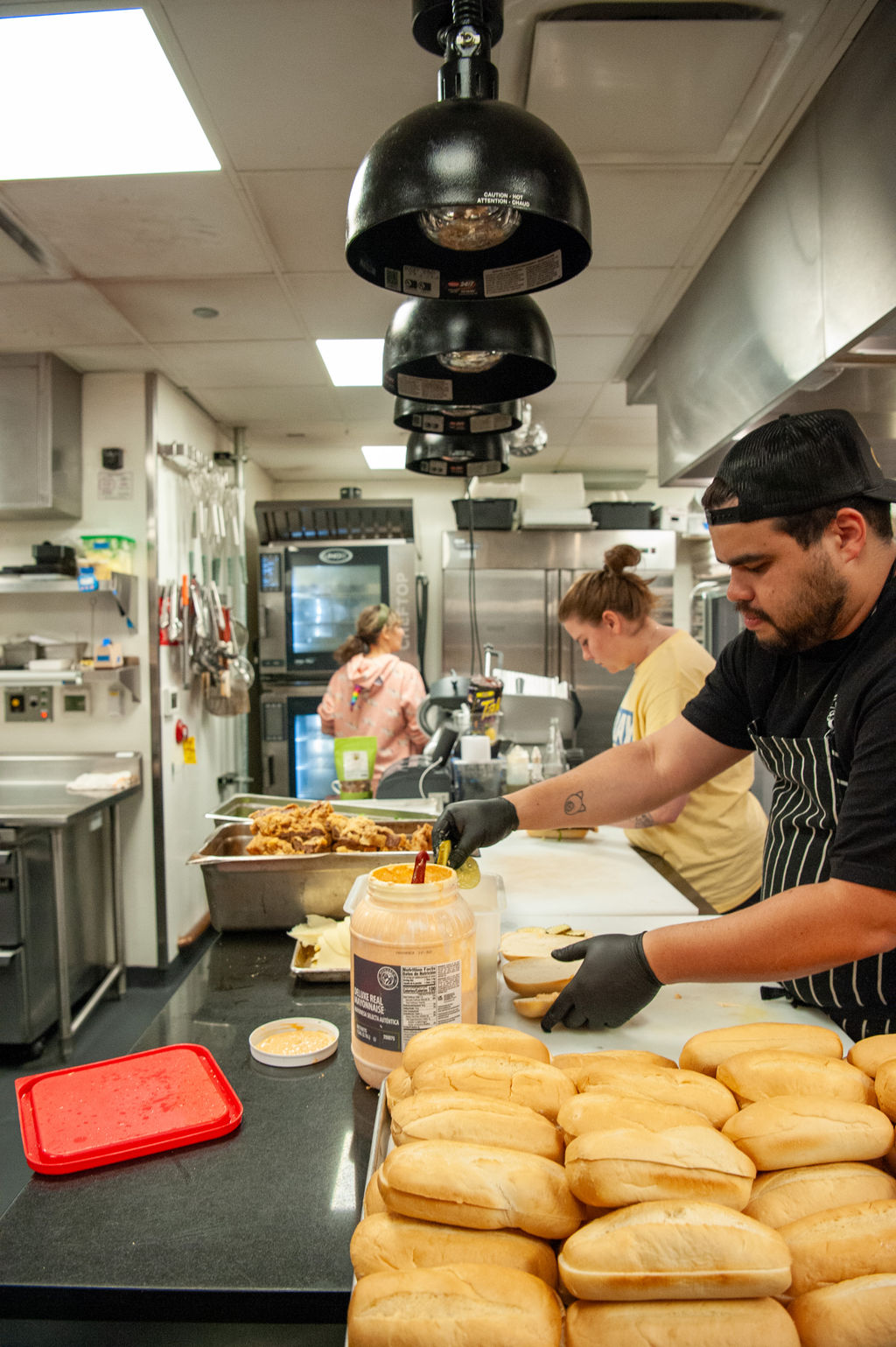 The kitchen staff prepares meals at a restaurant