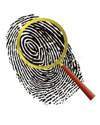 Picture of a fingerprint with a magnifying glass 