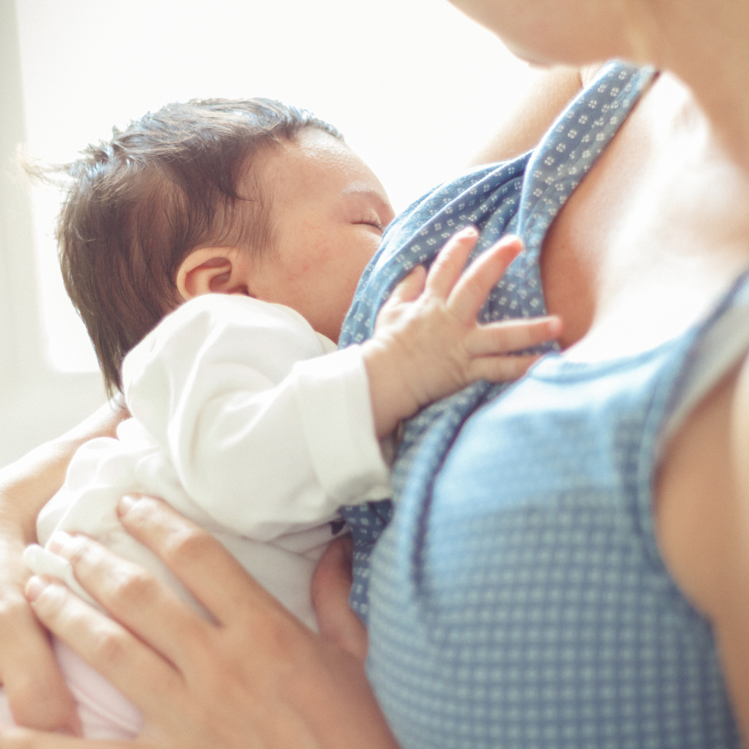 Mother breastfeeding her baby