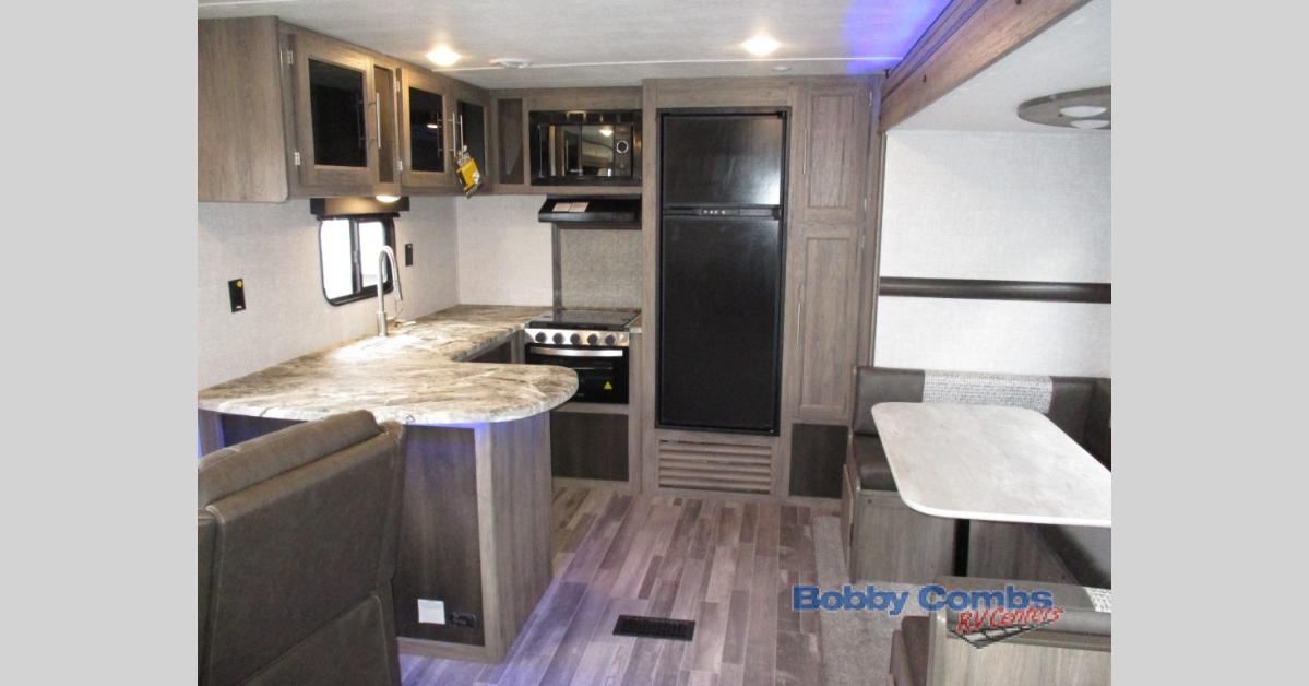 Kitchen and slide out in the CrossRoads Zinger travel trailer