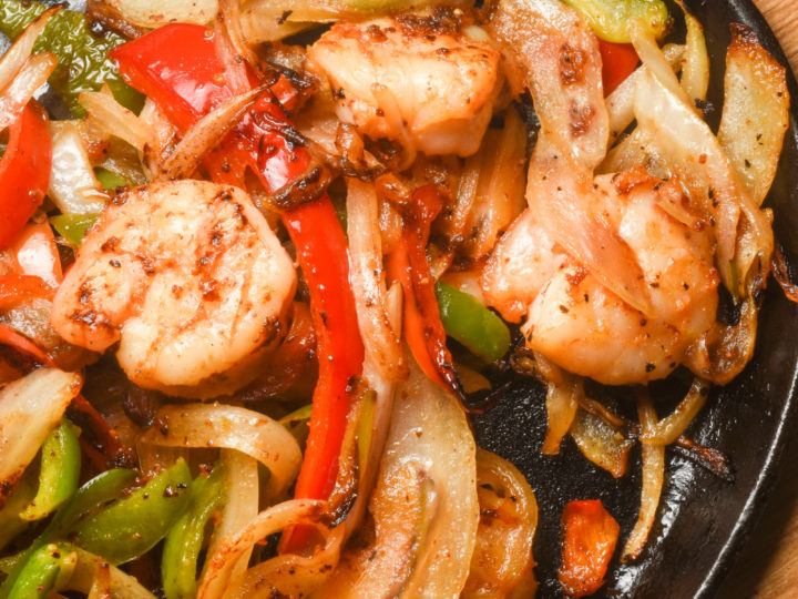 keto shrimp fajitas cooked in a cast-iron skillet