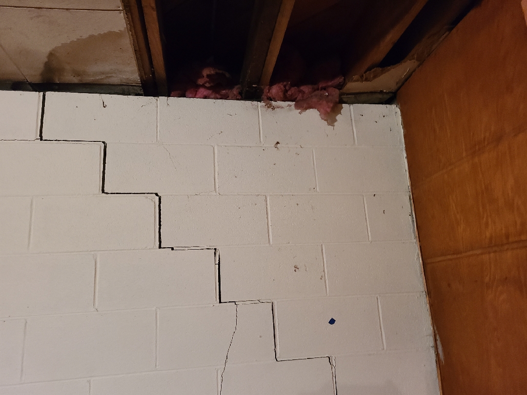 Bowing walls in Utica, OH.  Mid State Basement Systems can help.