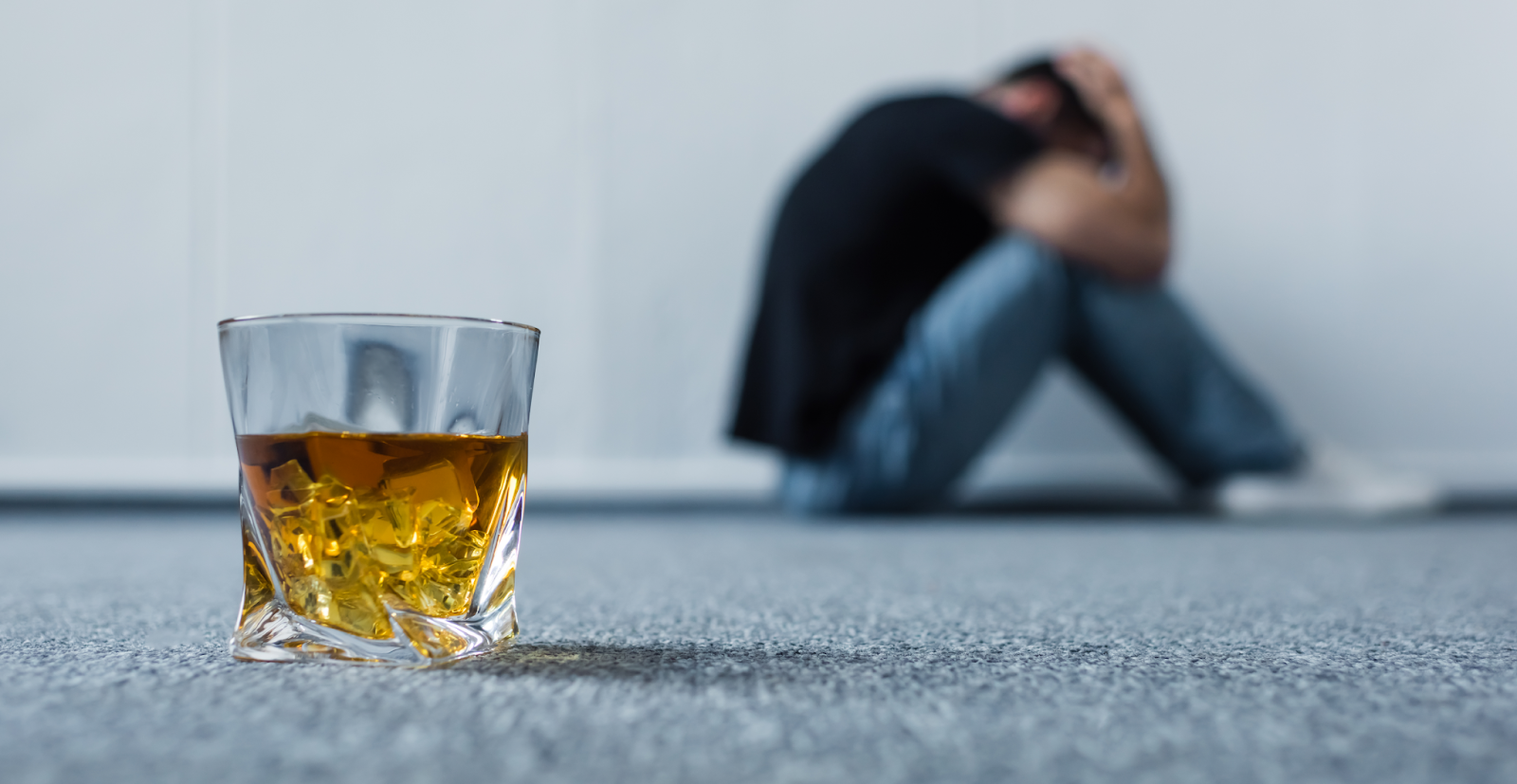depressed man with alcohol