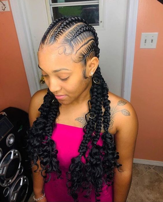 tatted lady wearing medium feed-in hairstyle