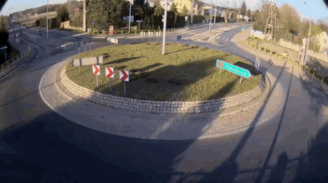 Car hitting a roundabout and flying into the air