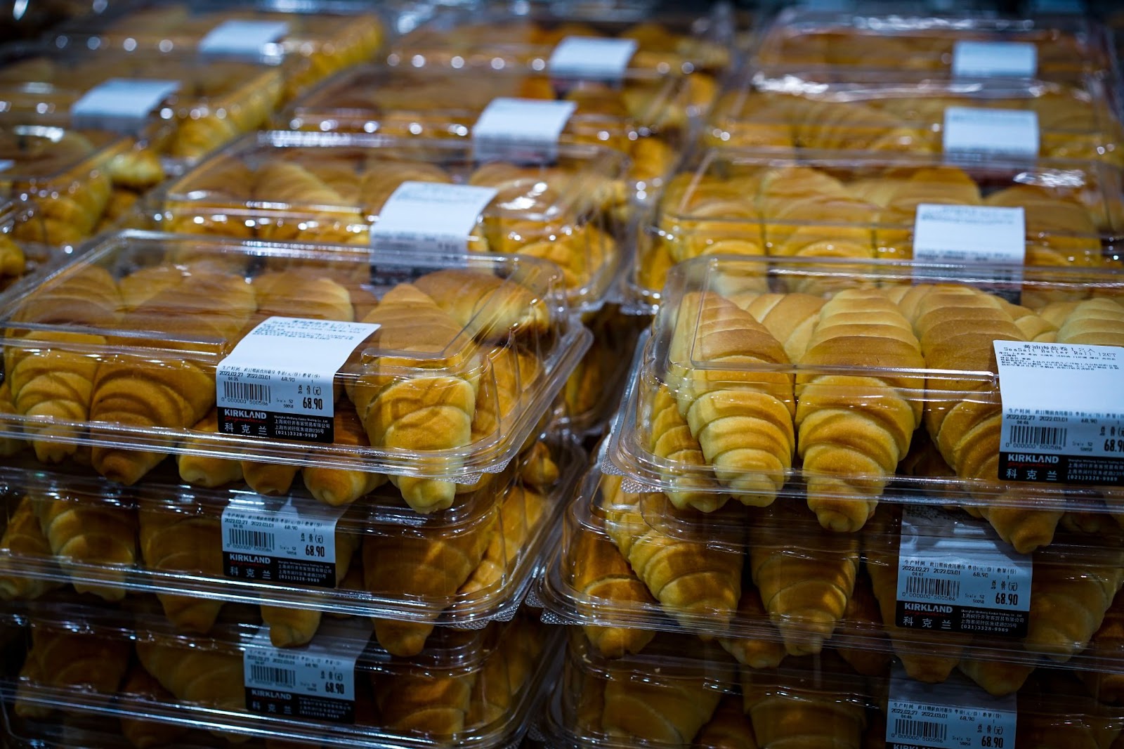 packages of croissants stacked up at the grocery store