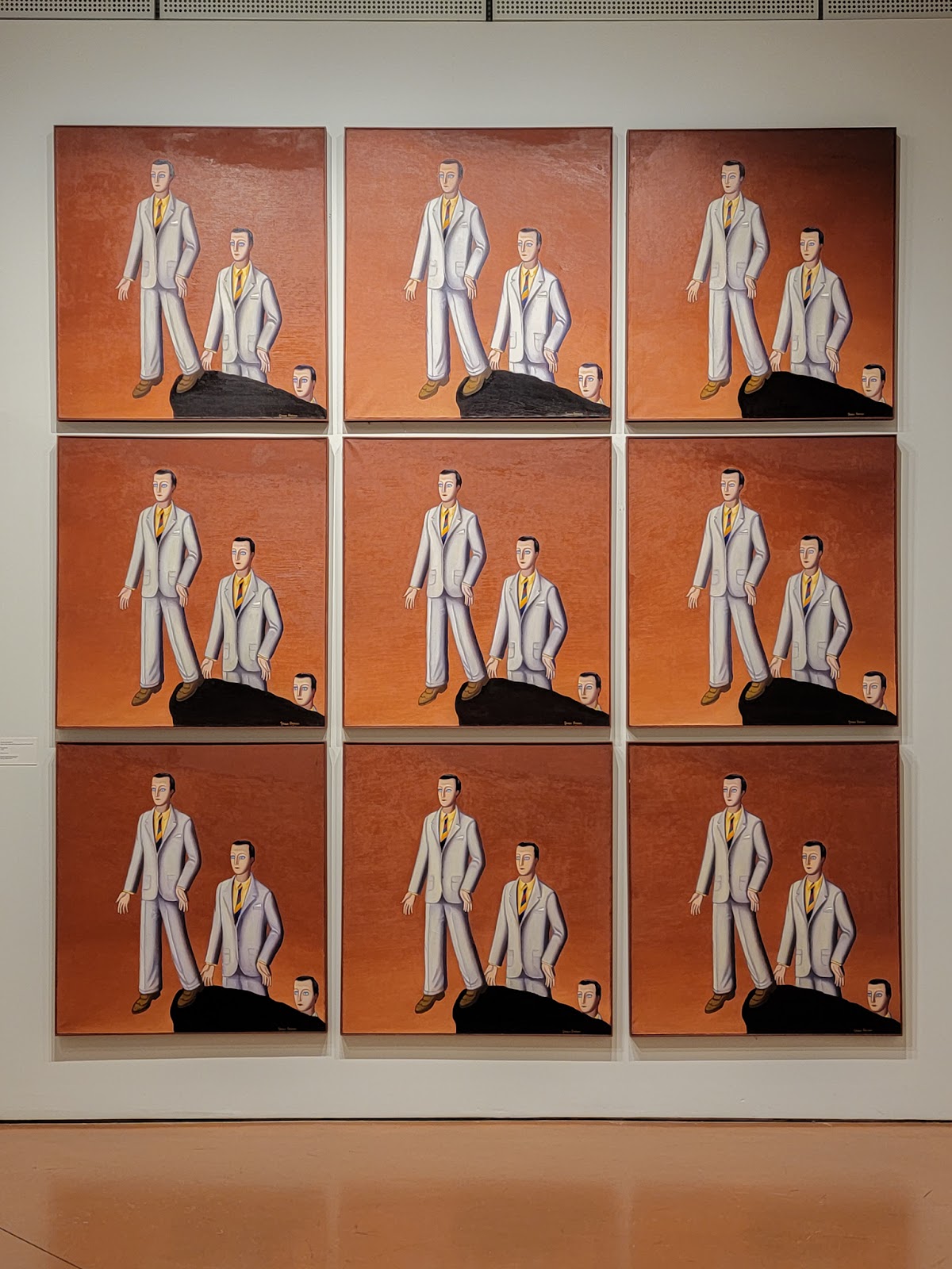 Nonconformist Soviet art at the Zimmerli Museum | A 3x3 grid of the same painting of men walking off a cliff and identical men behind them about to follow suit.