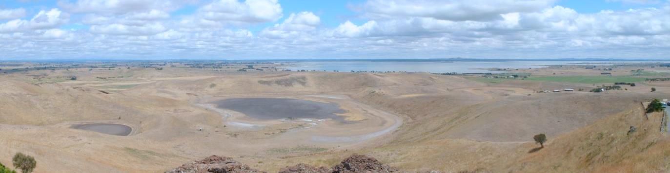 panoramic view of colac lakes and fields in australia on a cloudy day