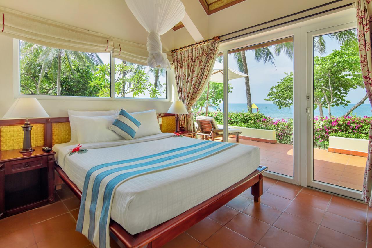 Giường trong phòng chung tại Victoria Phan Thiet Beach Resort & Spa
