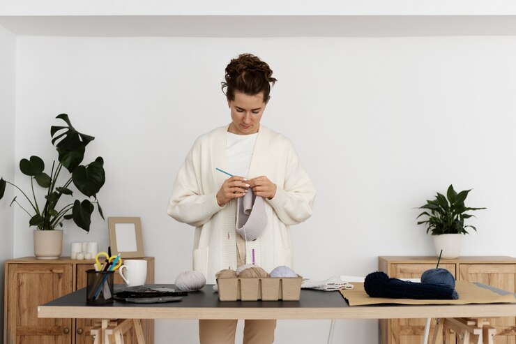 Woman Organizing Knitting Products