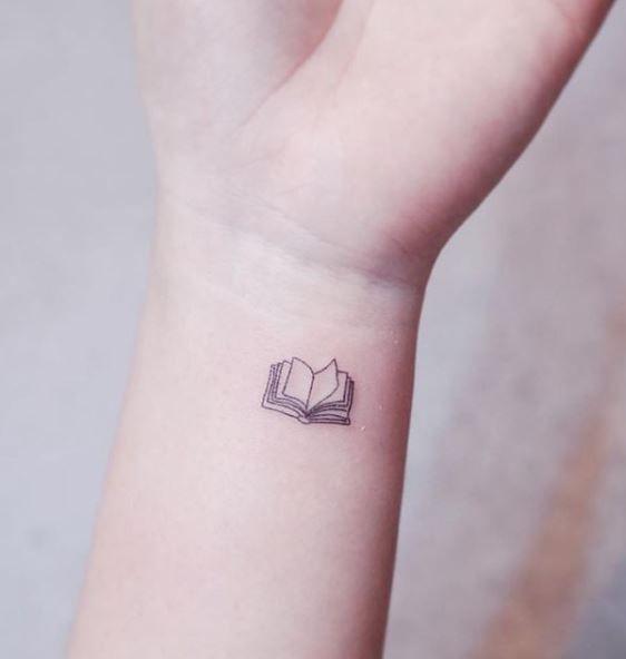 Minimalist Book Tattoo | Book tattoo, Minimalist book, Tattoos