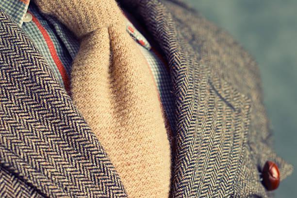Retro vintage twill jacket with woolen necktie - Close-up Shallow depth of focus. Slightly toned. wool ties stock pictures, royalty-free photos & images