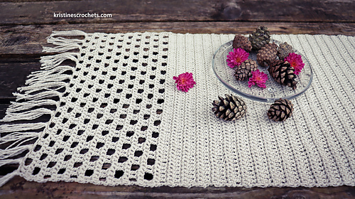 table runner with fringe on wooden background