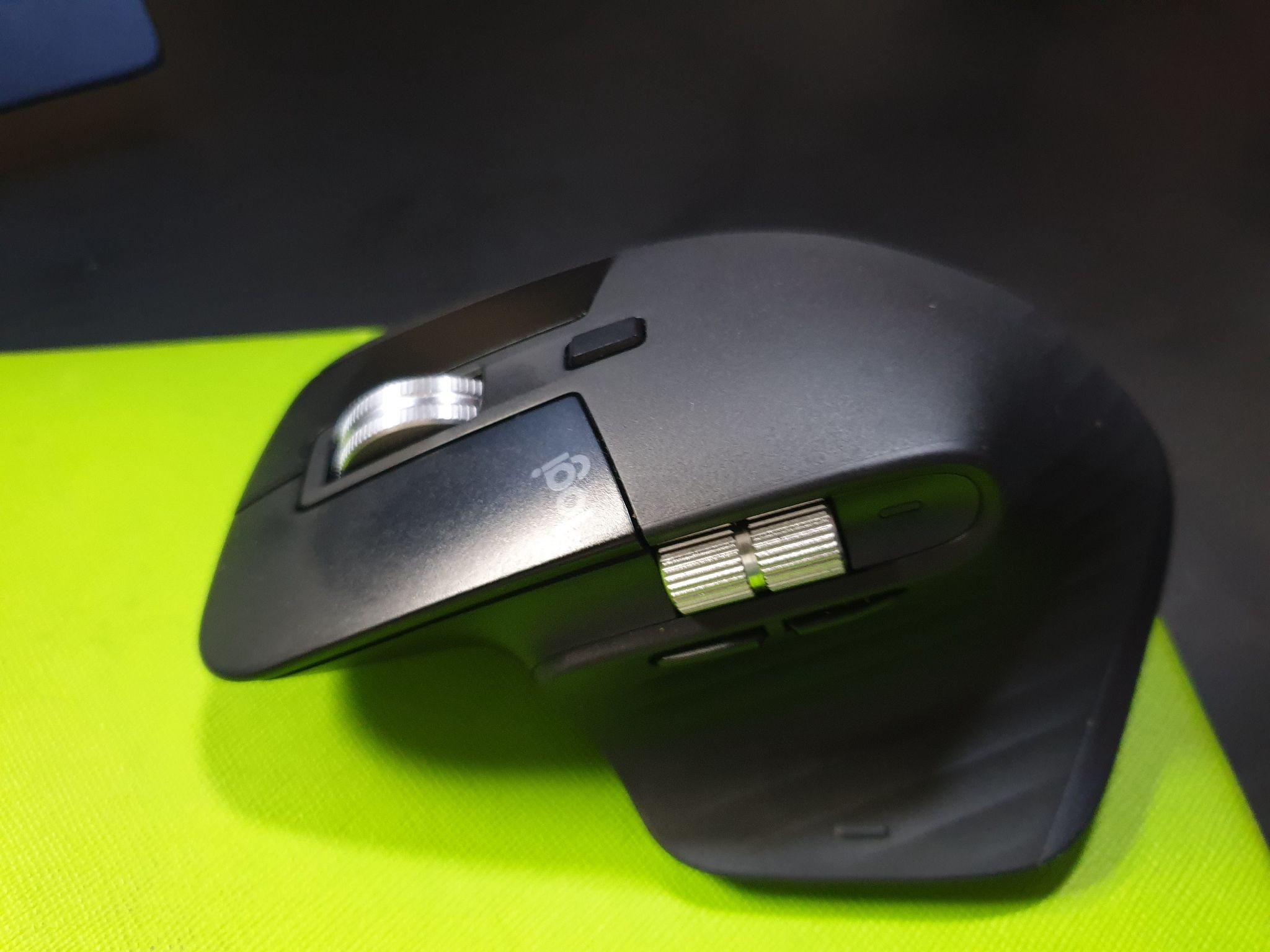 Close up profile picture of the Logitech MX Master 3 mouse with horizontal scroll wheel.