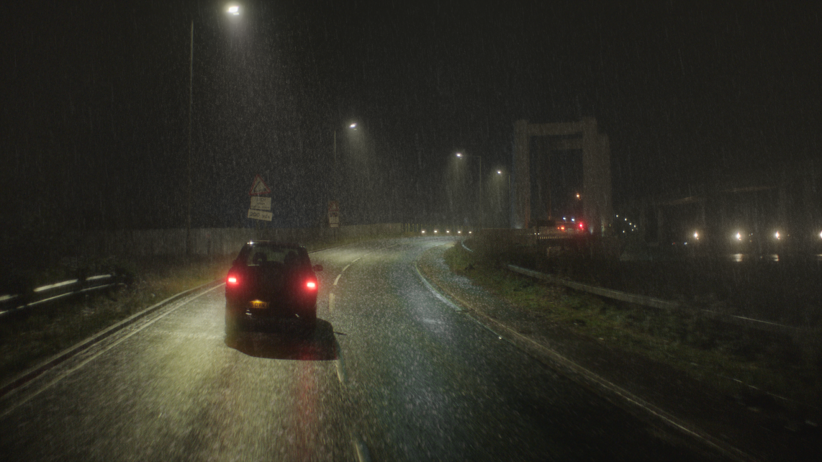 Final shot of the car driving up to the bridge in the simulated rain for ITV's Too Close. 