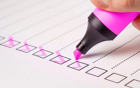Graphic of checklist with pink ticks