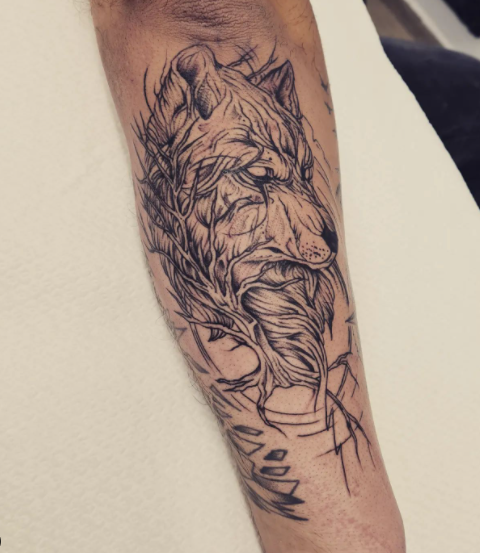 Attractive Ink Alpha Wolf Tattoo On Forearm