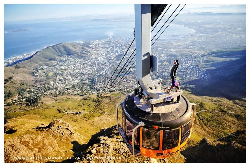 PICS | 'Spider-Man' does incredible handstand on Table Mountain cable car | News24
