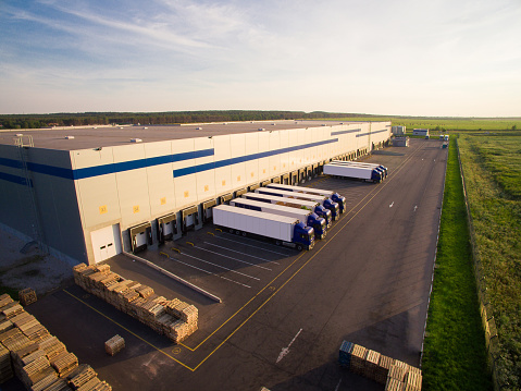 trucks in a hanger ready to deliver