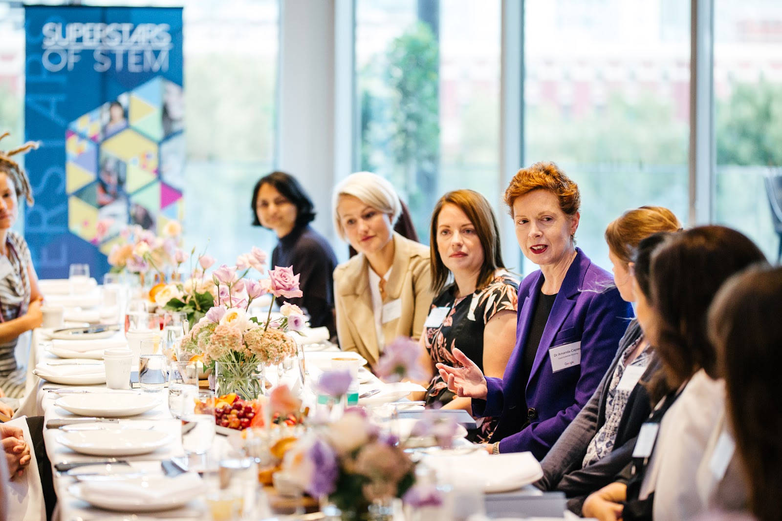 Photos of event attendees at the Women in STEM breakfast