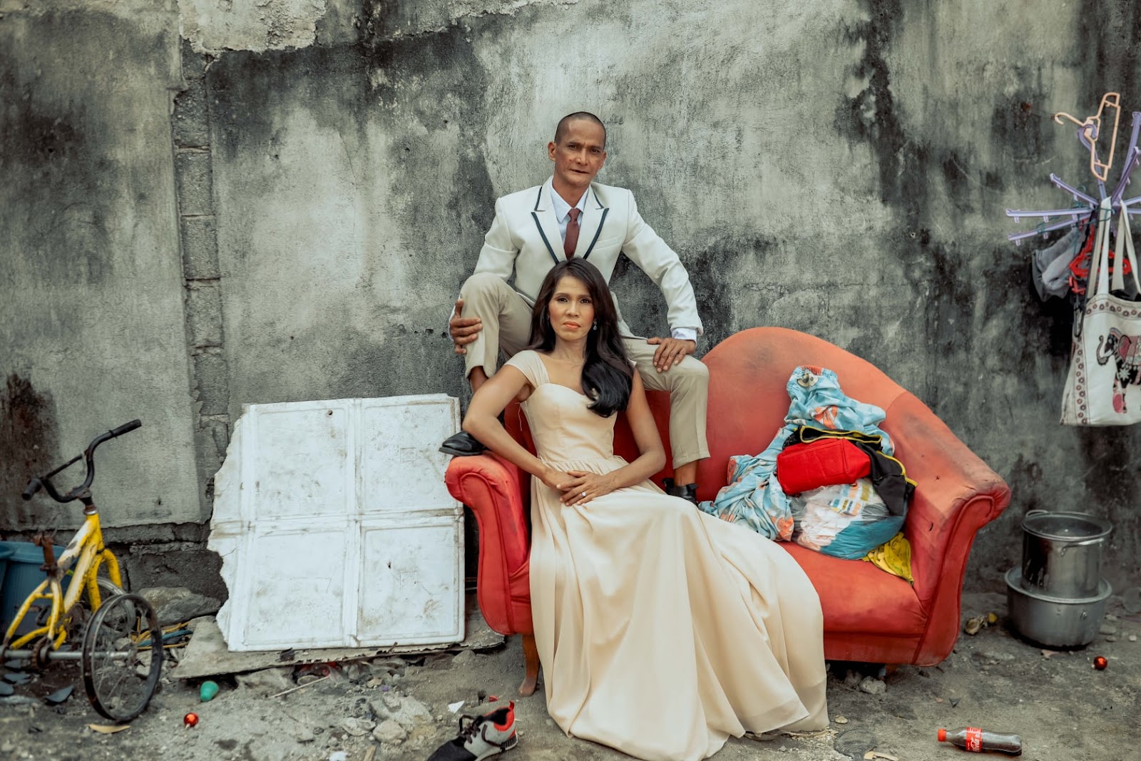 Rommel and Rosalyn wear another gown and suit for the photo shoot