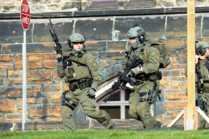 Radicalized gunman attacks Parliament Hill