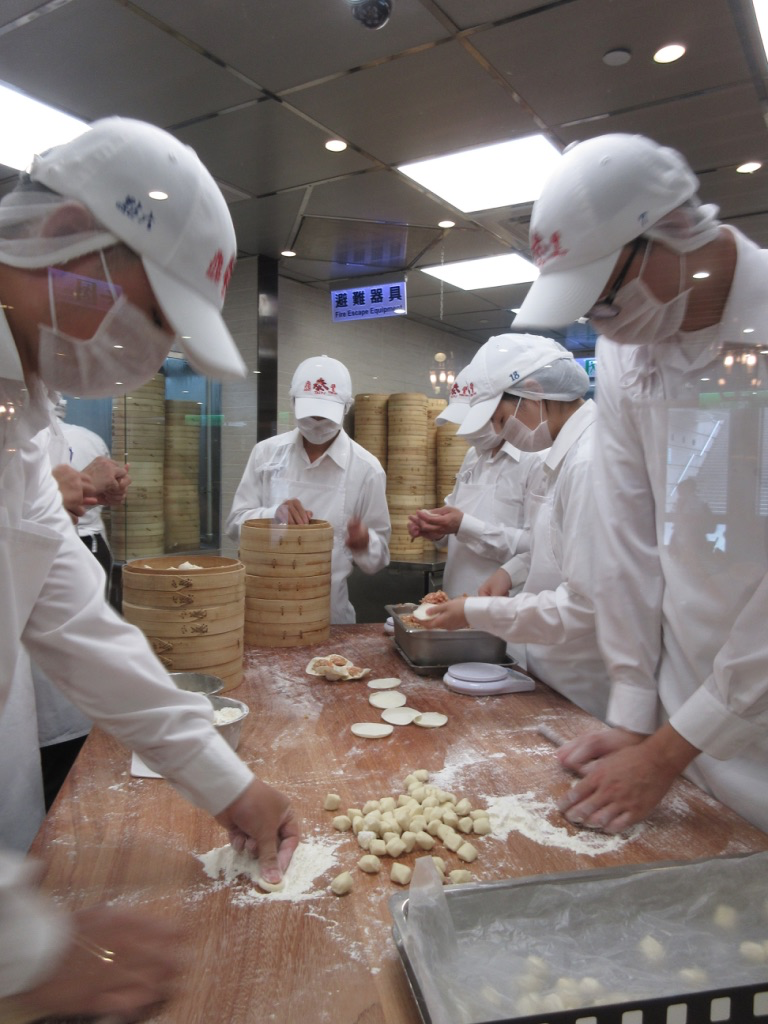 Xiao long bao making at Din Tai Fung Taipei, Taiwan Xiao long bao making at Din Tai Fung Taipei, Taiwan