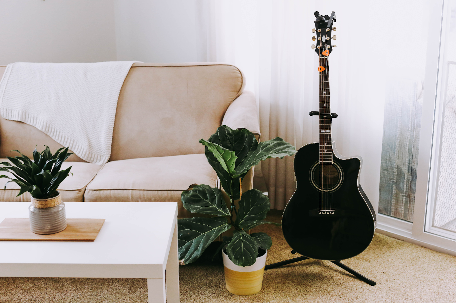 black guitar in living room