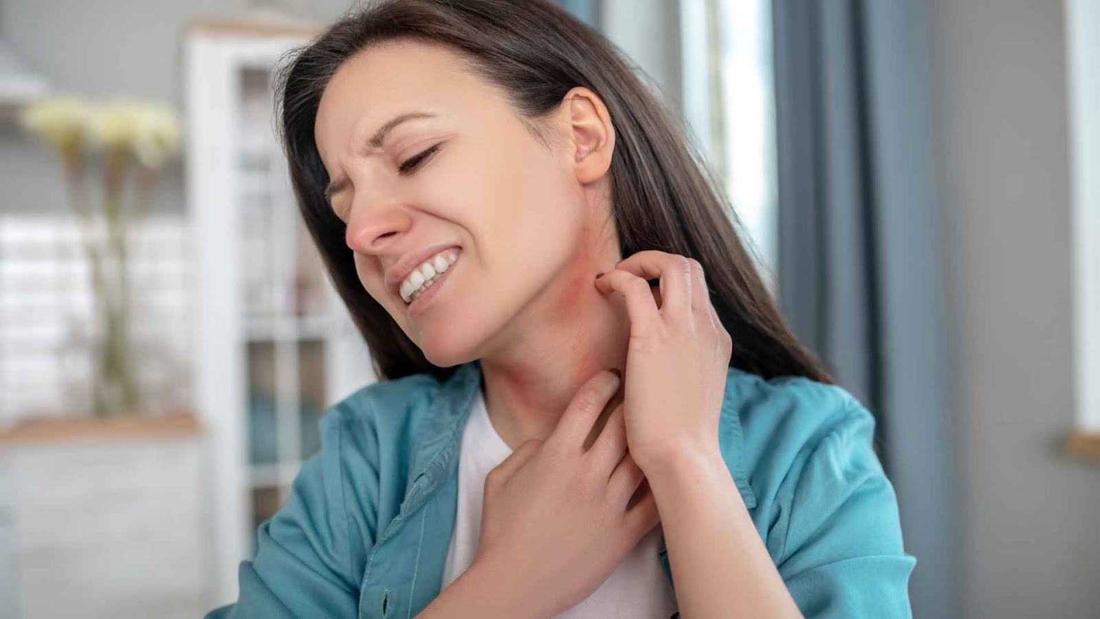 woman scratching painful itch