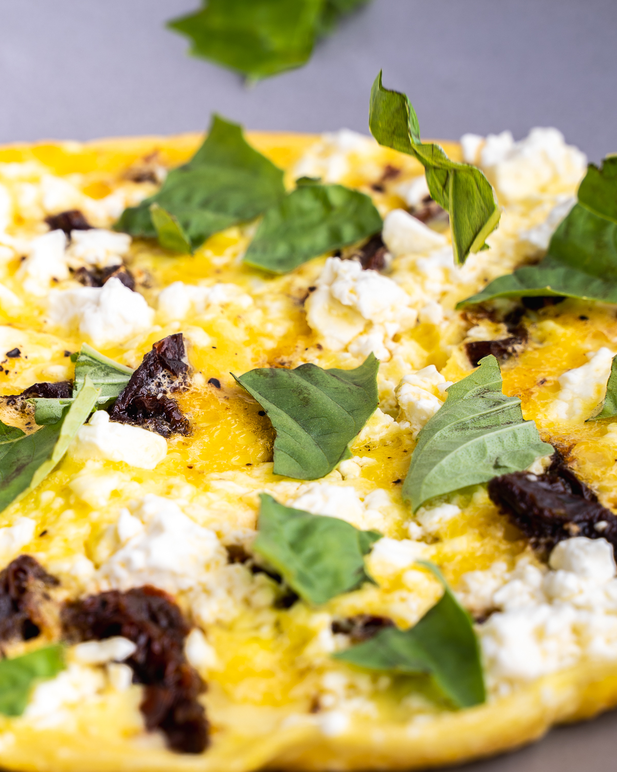 sun-dried tomato omelette topped with basil