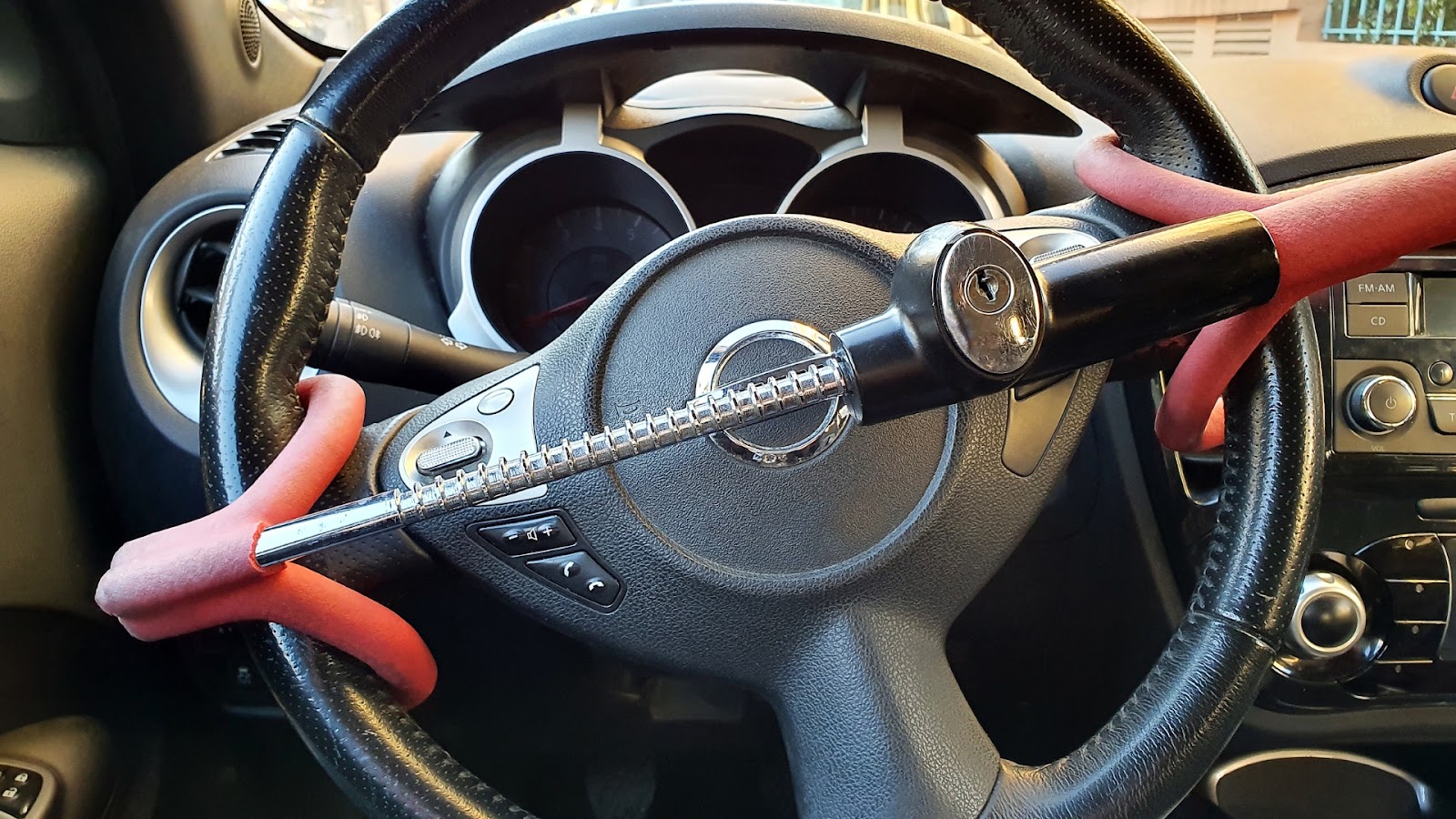 A steering wheel with a steering wheel lock