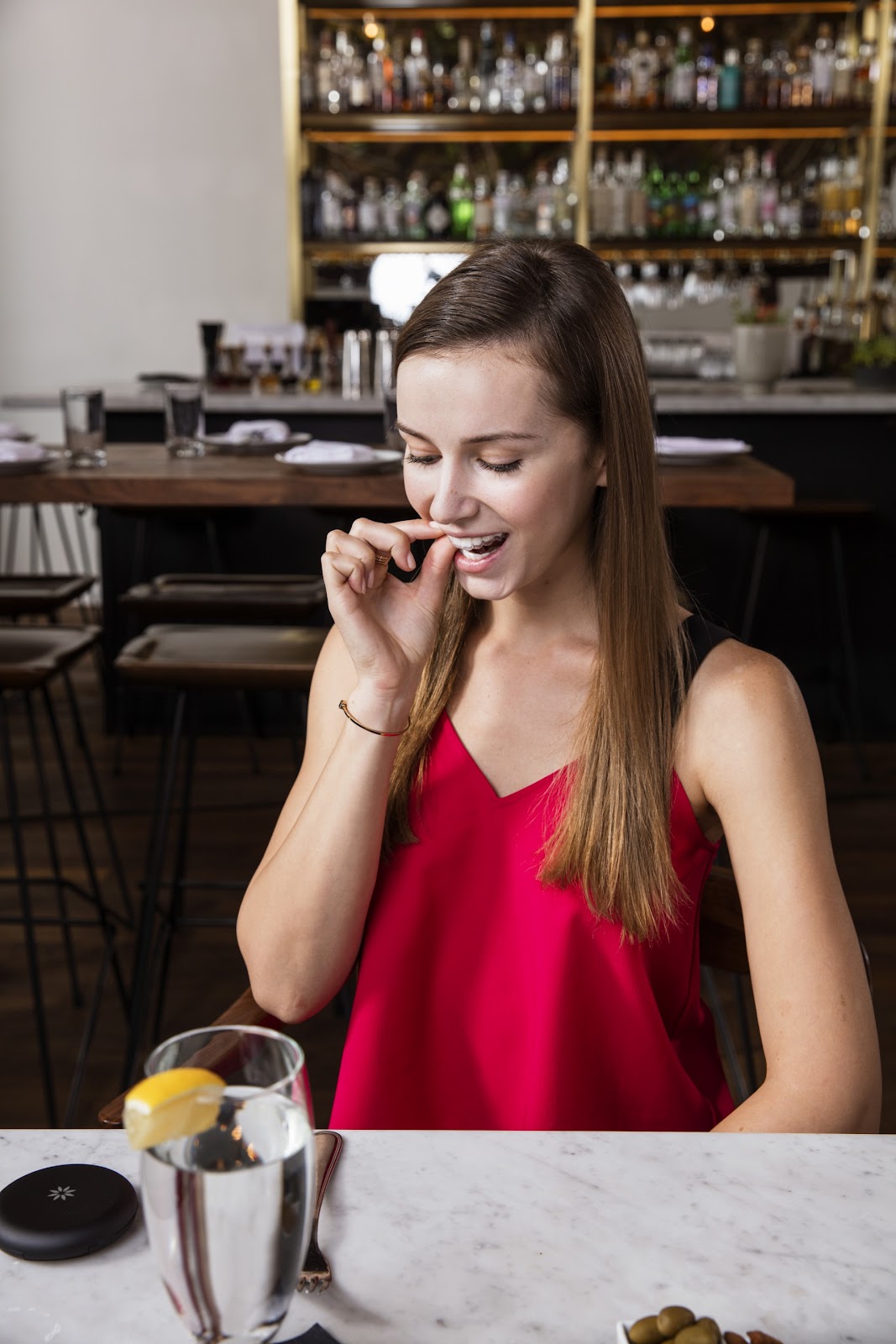 lady with Invisalign