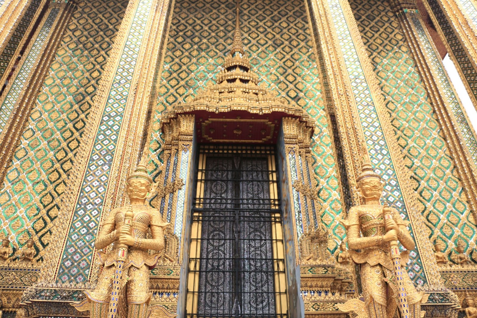 24 hours in Bangkok. This image is one of the many doors at Wat Phra Kaew or the Temple of the Emerald Buddha. 