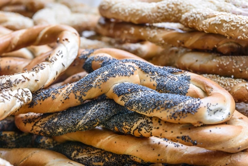 German pretzels covered with sesame, caraway, and poppy seeds