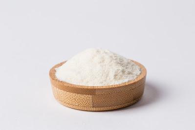 Milk Powder in a wooden bowl