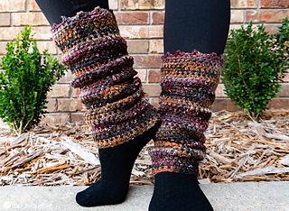 woman wearing black tights and variagated yarn leg warmers