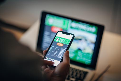 https://media.istockphoto.com/photos/mature-man-using-mobile-app-for-live-betting-picture-id1193802562?b=1&k=20&m=1193802562&s=170667a&w=0&h=4-R2cYBrjjkdyJLIVshkqMsQQtSOKrE9HieHNAds5U8=