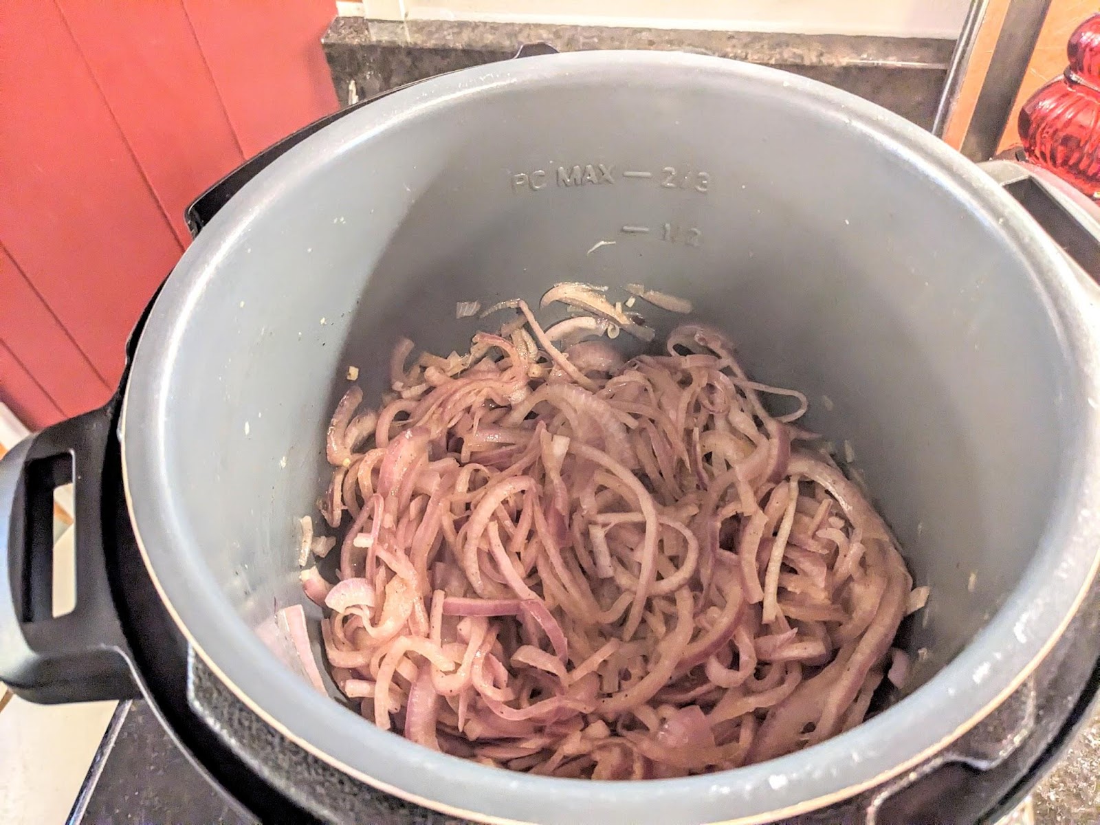 Slice red onions starting to cook in the Instant Pot