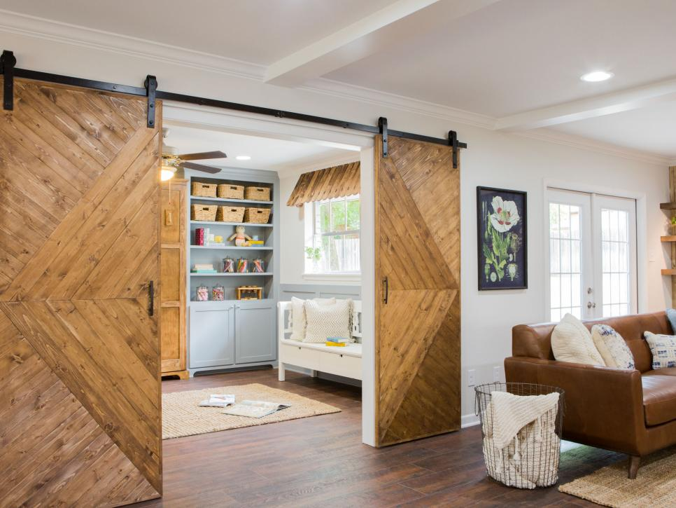 Sliding barn divider doors that give a rustic farmhouse feel at home