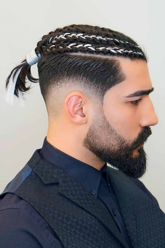 man wearing braided hair with fades