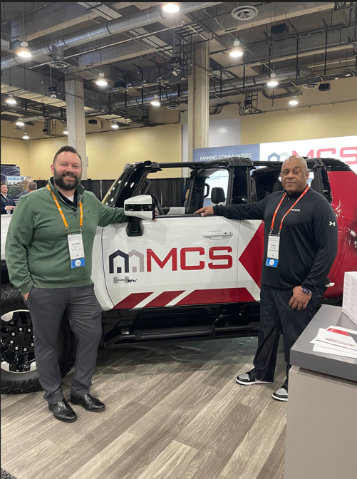 Shawn Prince, Head of Business Development, Attentive.ai with Dana Russell - VP of Exteriors at MCS at MCS booth at the ConnexFM 2023.