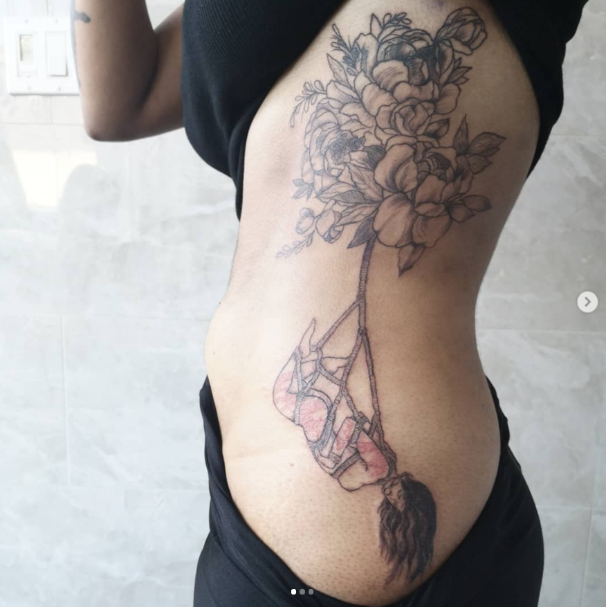 Flower Themed Rib Tattoos 6