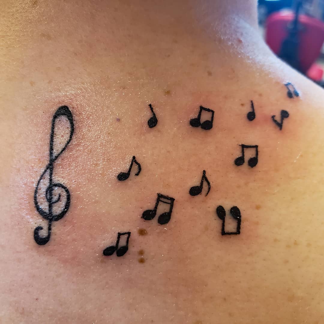 Small Music Symbol Tattoo