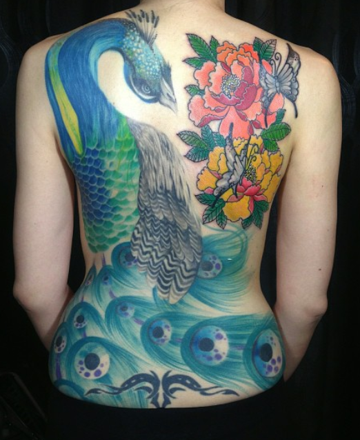 Tattoo Of A Peacock And Flowers