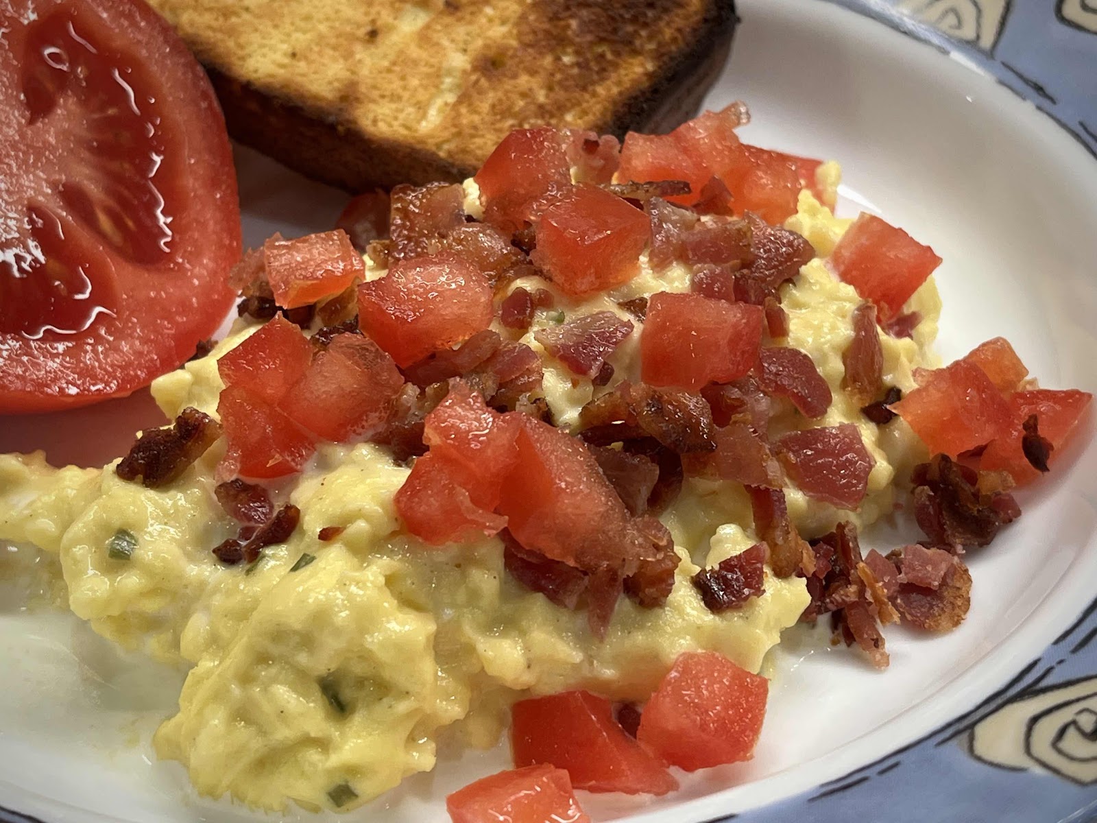 Stirred Scrambled Eggs with Bacon and Tomato