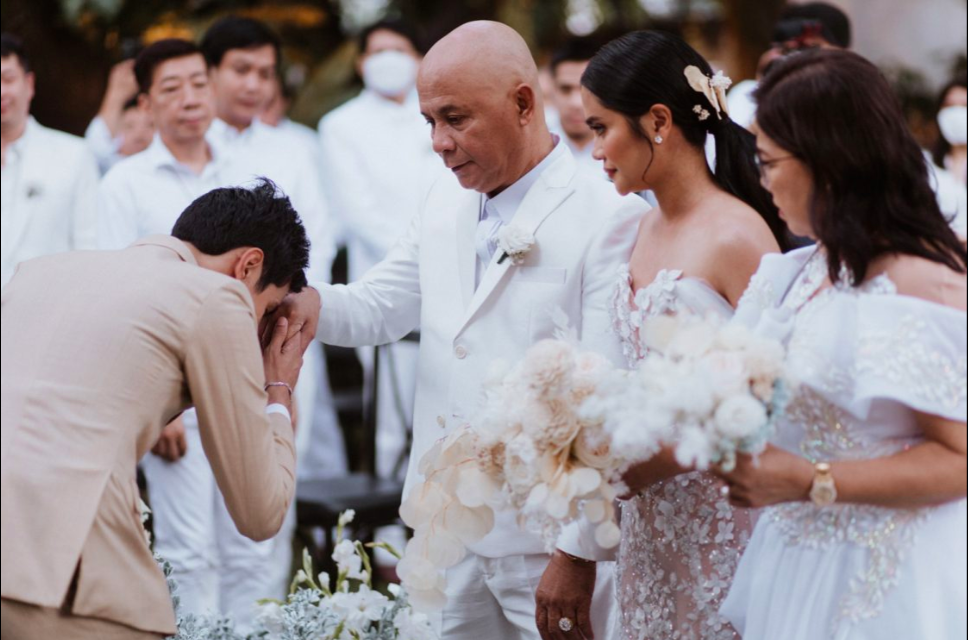 The blessing of each other's family is important in every Filipino wedding.