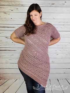 woman wearing an asymmetrical crochet tunic