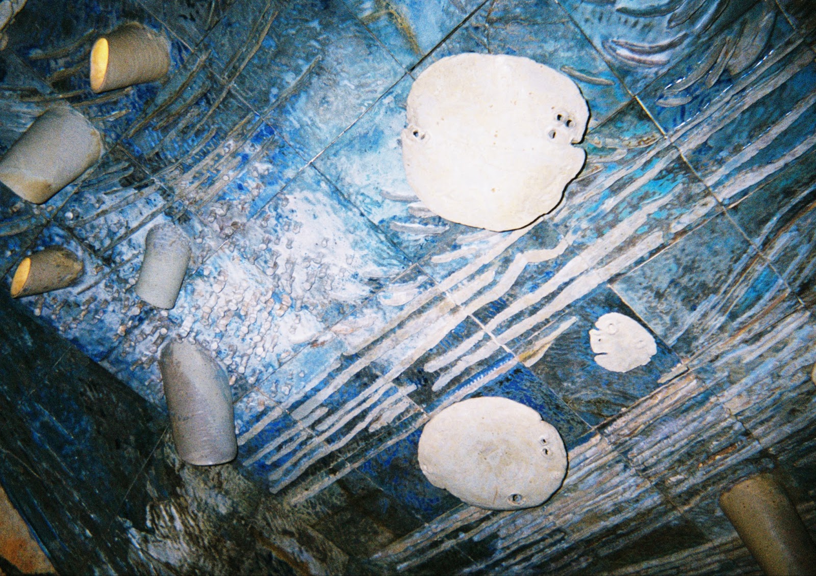 Image: Detail shot of Earth, Water, Sky, 1968. Blue etchings into the material and some protruding cylinders. Courtesy of the artist.